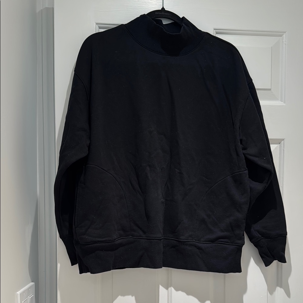 ALO Yoga Black “Refresh pullover” mockneck sweatshirt.